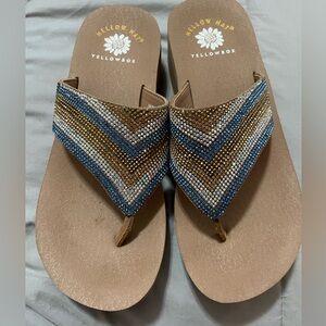 Yellow box flip flops